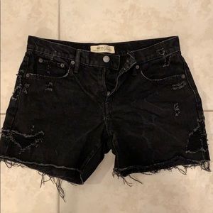 Destroyed black denim shorts